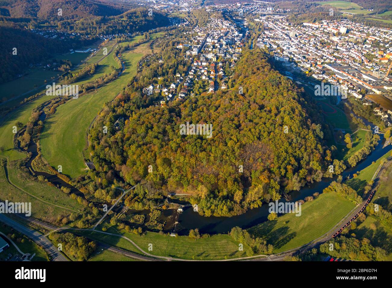 Aerial view, town view Wennigloh in forested autumn colors, entwined by the Eichholz forest and the river Ruhr, Arnsberg, Sauerland, North Rhine-Westphalia, Germany Stock Photo