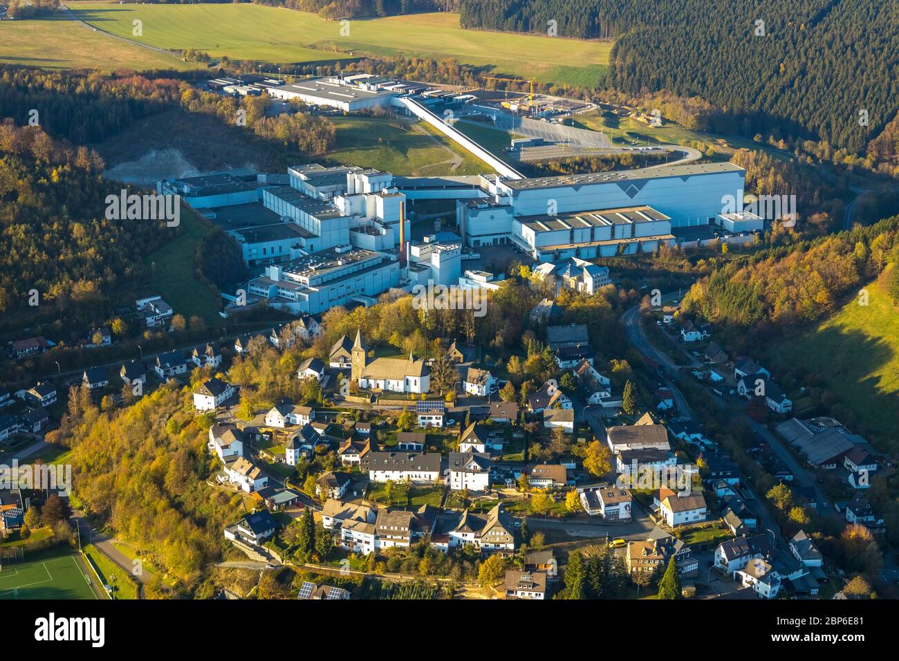 Aerial view, brewery C. & A. VELTINS GmbH & Co. KG, town view Grevenstein with church St. Antonius Einsiedler, Grevenstein, Meschede, Sauerland, North Rhine-Westphalia, Germany Stock Photo