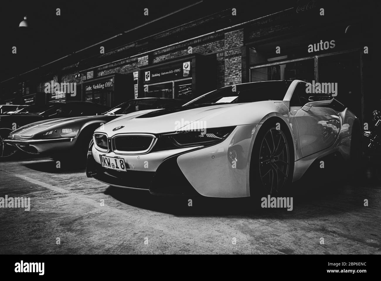 BERLIN - MAY 11, 2019: Plug-in hybrid sports car BMW i8. Black and white, stylization. 32th Berlin-Brandenburg Oldtimer Day. Stock Photo