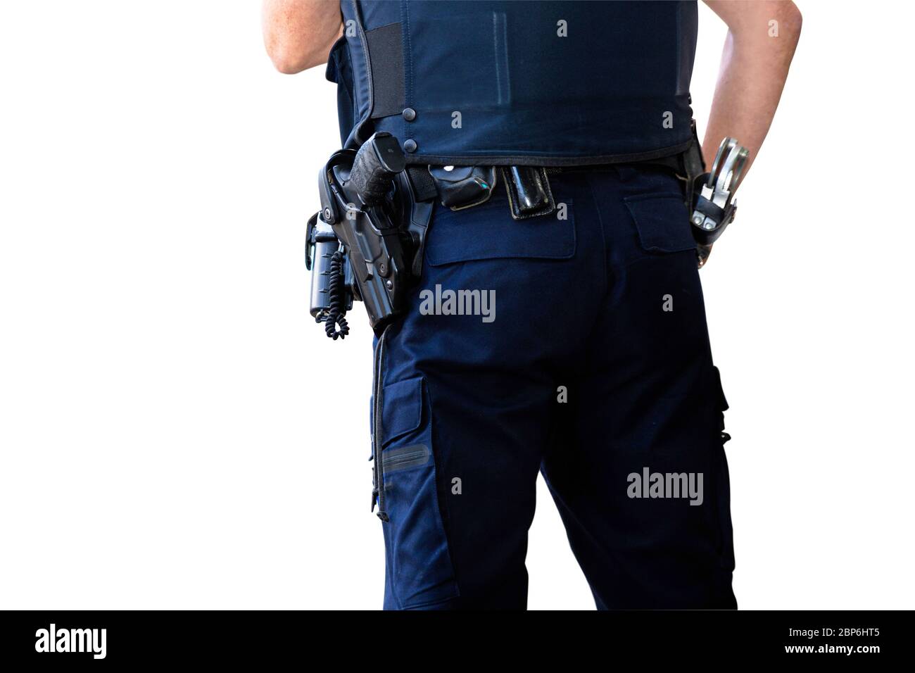 Police officer, with gun belt, handcuffs phone and pepper-spray. Isolated on white background Stock Photo