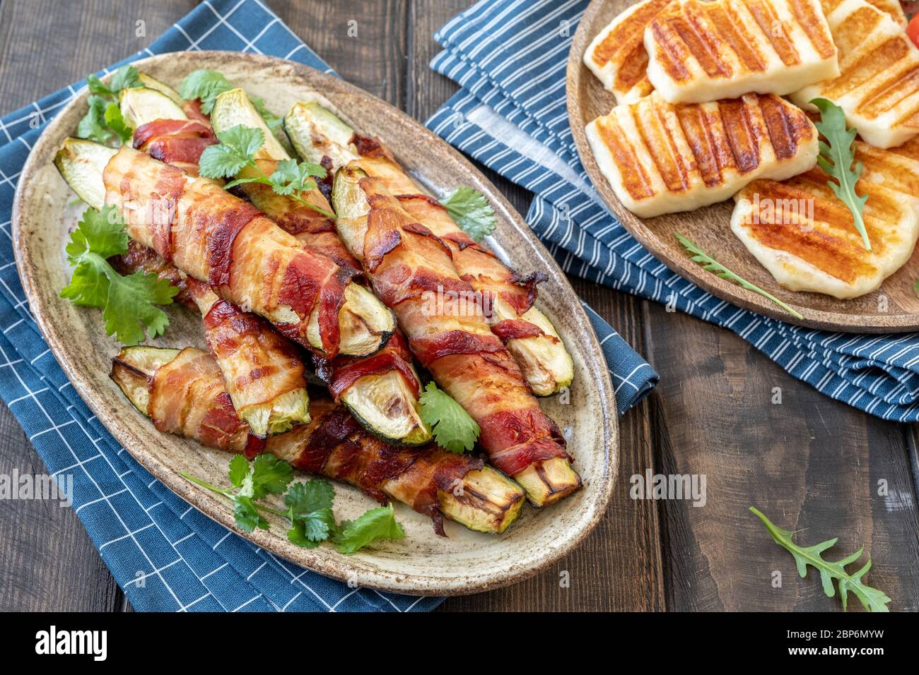 Grilled zucchini fries wrapped in a bacon and halloumi cheese Stock