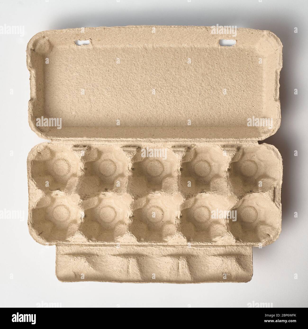 Cardboard egg tray isolated on a white background. Egg packaging top