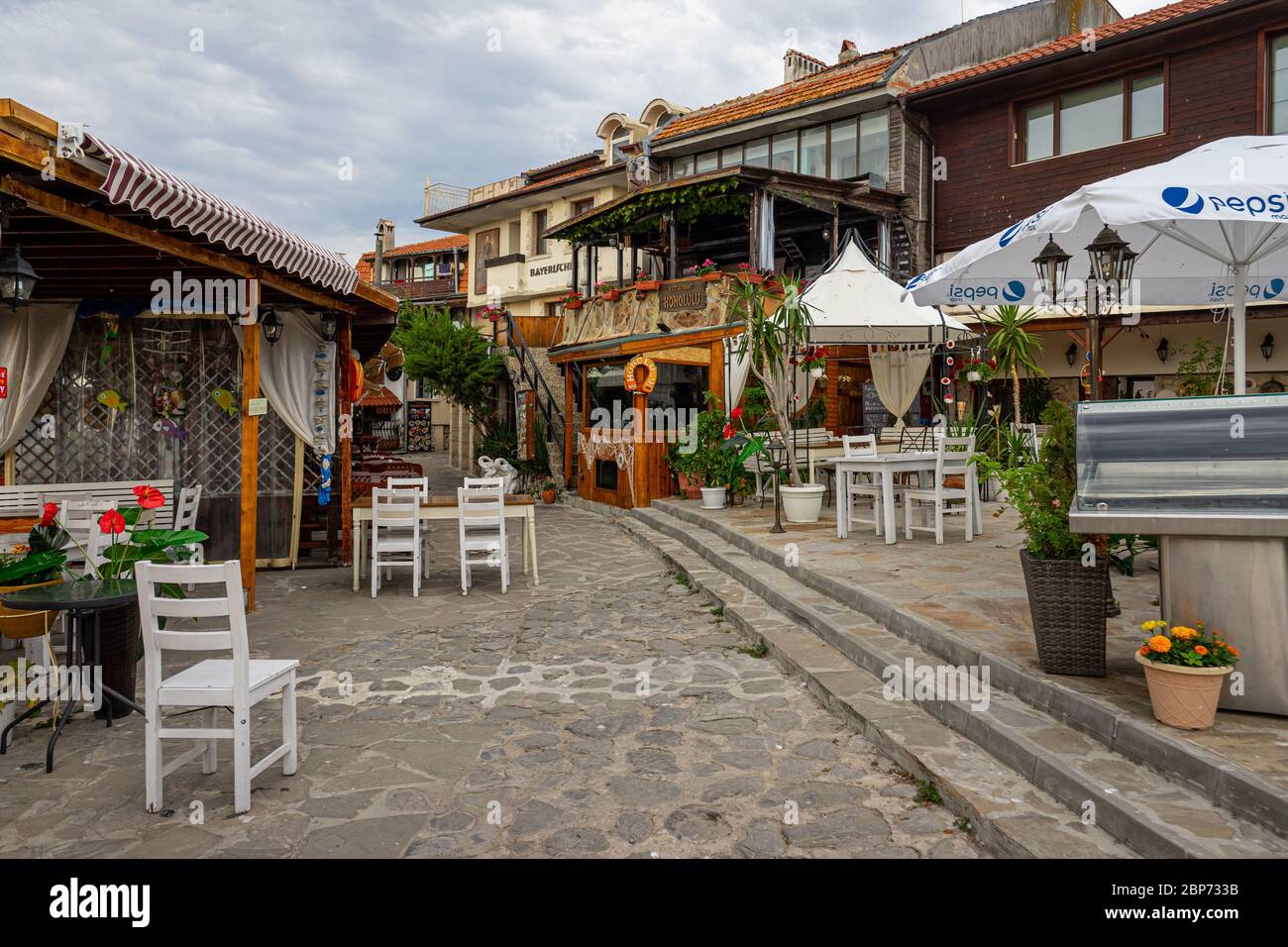 NESSEBAR, BULGARIA - JUNE 22, 2019: Closed restaurant on the promenade of the ancient coastal city. Early morning. Stock Photo