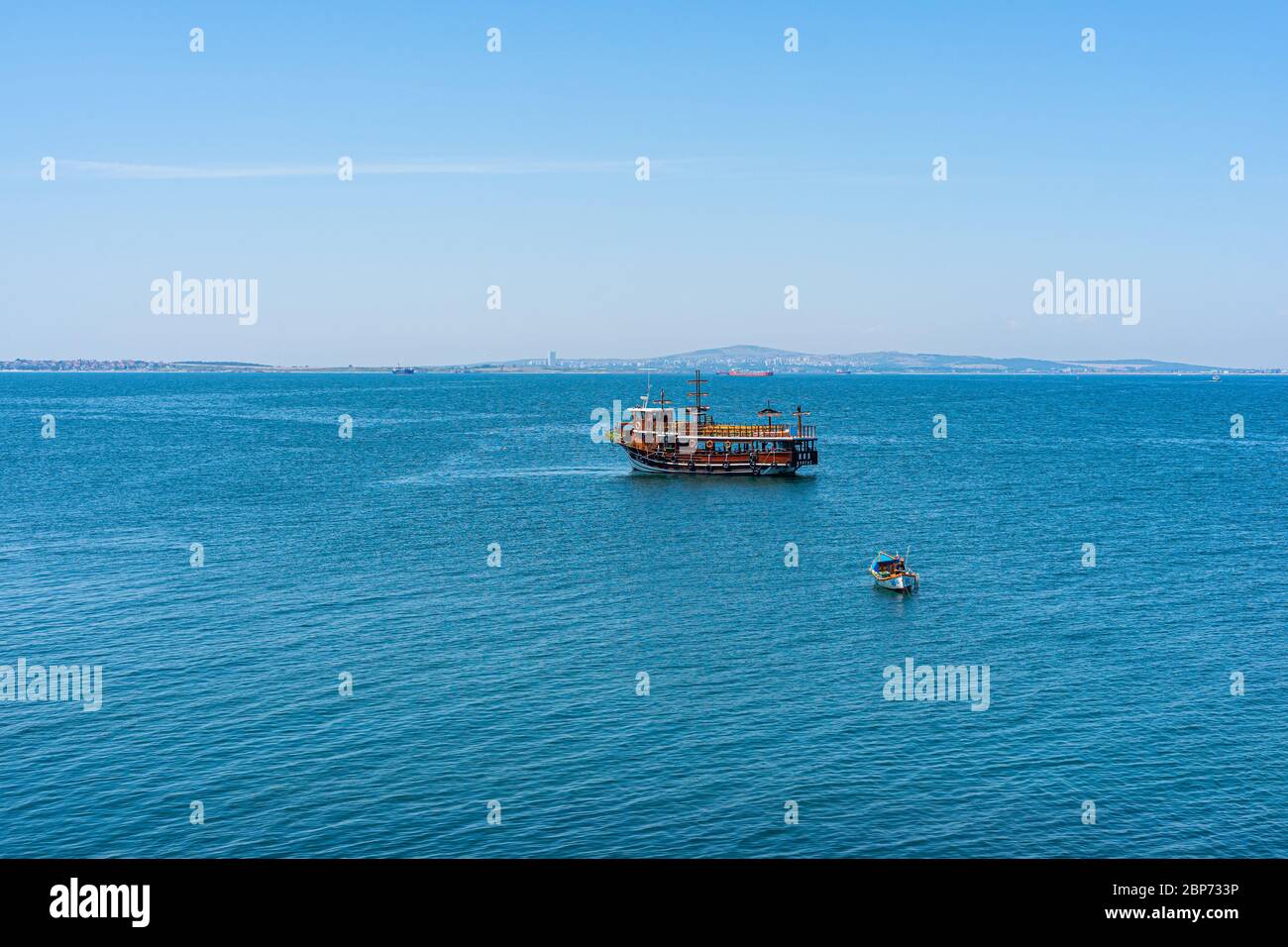 ST. ANASTASIA ISLAND, BULGARIA - JUNE 23, 2019: Pleasure boat in the Burgas Bay of the Black Sea. Sea view from the side of the island of St. Anastasia. Stock Photo