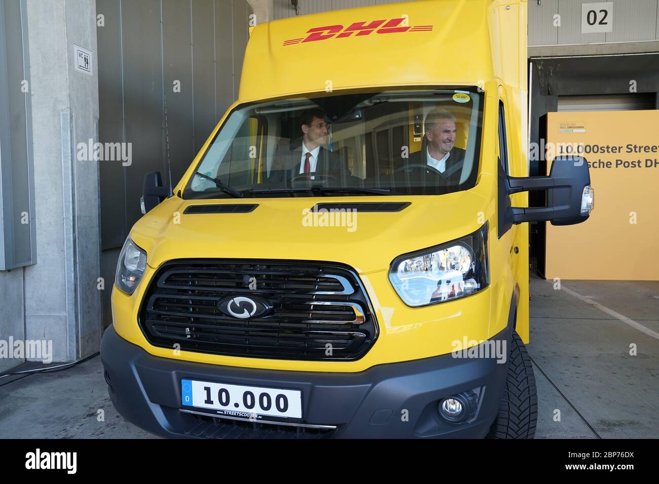 Fototermin '10.000ster StreetScooter bei Deutsche Post DHL Group' in Koeln Stock Photo