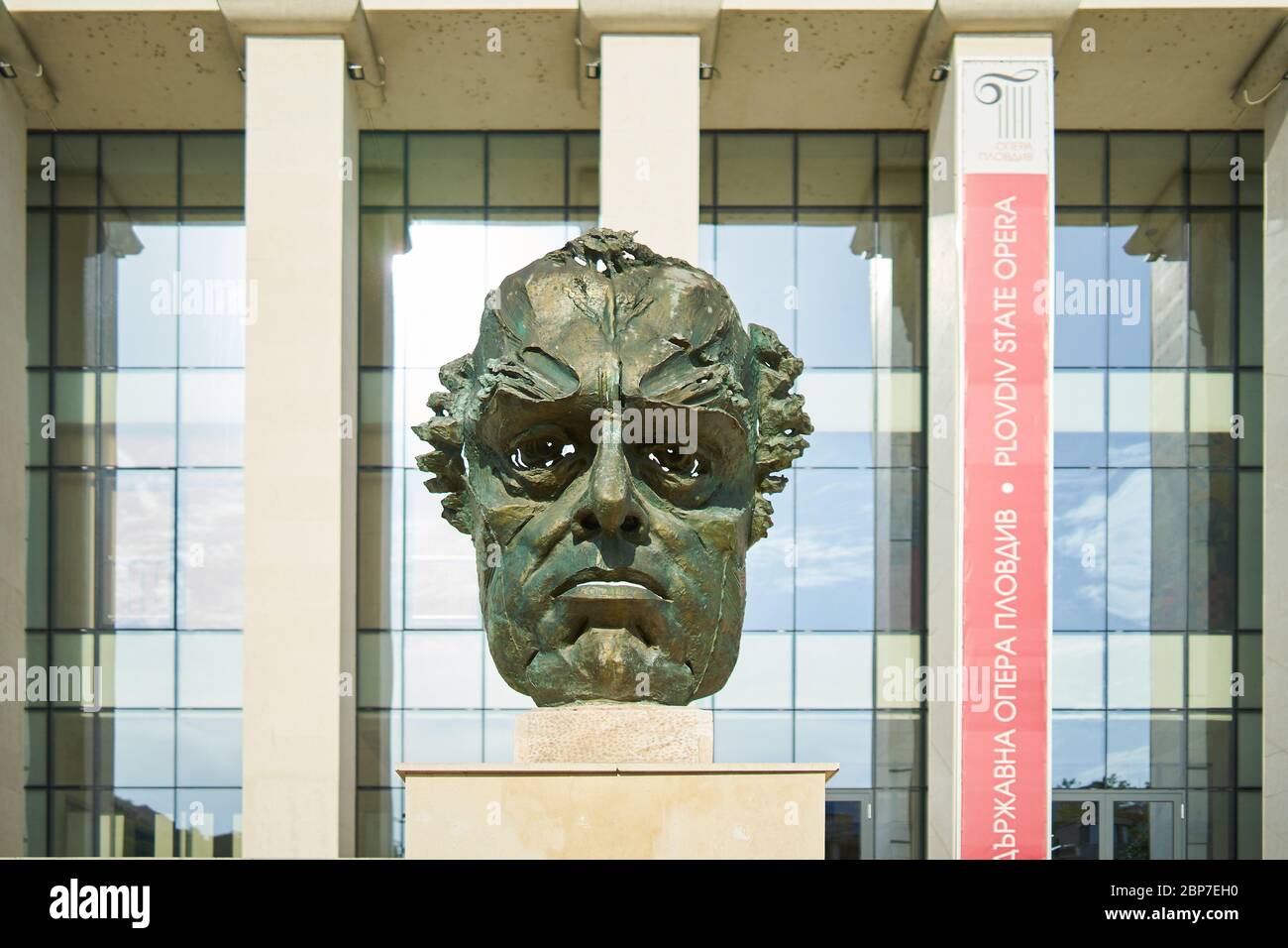 PLOVDIV, BULGARIA - JULY 02, 2019: Bust of Boris Christoff in front of the Boris Christoff House of Culture (Bulgarian opera singer). Stock Photo