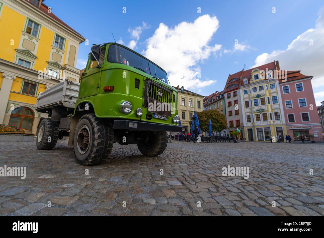 BAUTZEN, GERMANY - OCTOBER 10, 2019: City Hall Square and a medium-duty truck IFA W50 in the foreground. Stock Photo