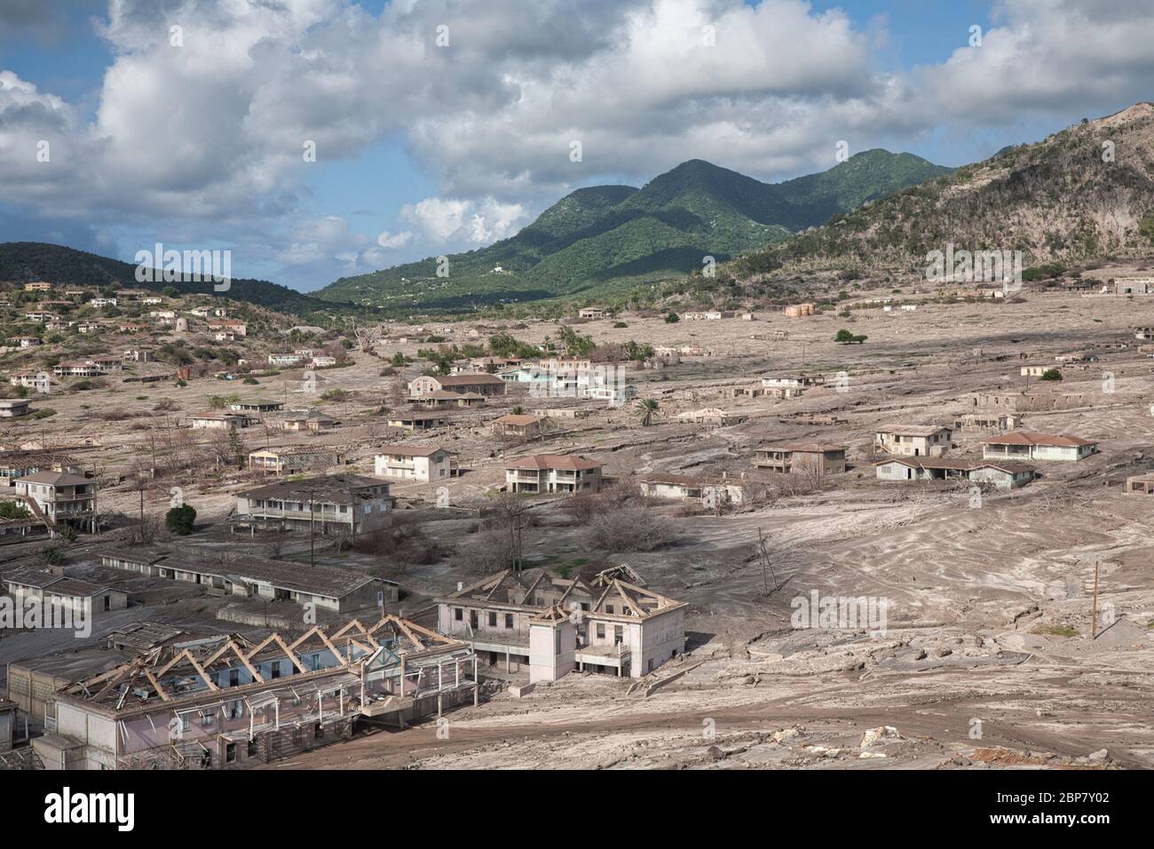 Plymouth, the old Capital of Montserrat in the Caribbean, West Indies, buried under mud and lava flows from the Soufriere Hills volcano in 1997 Stock Photo