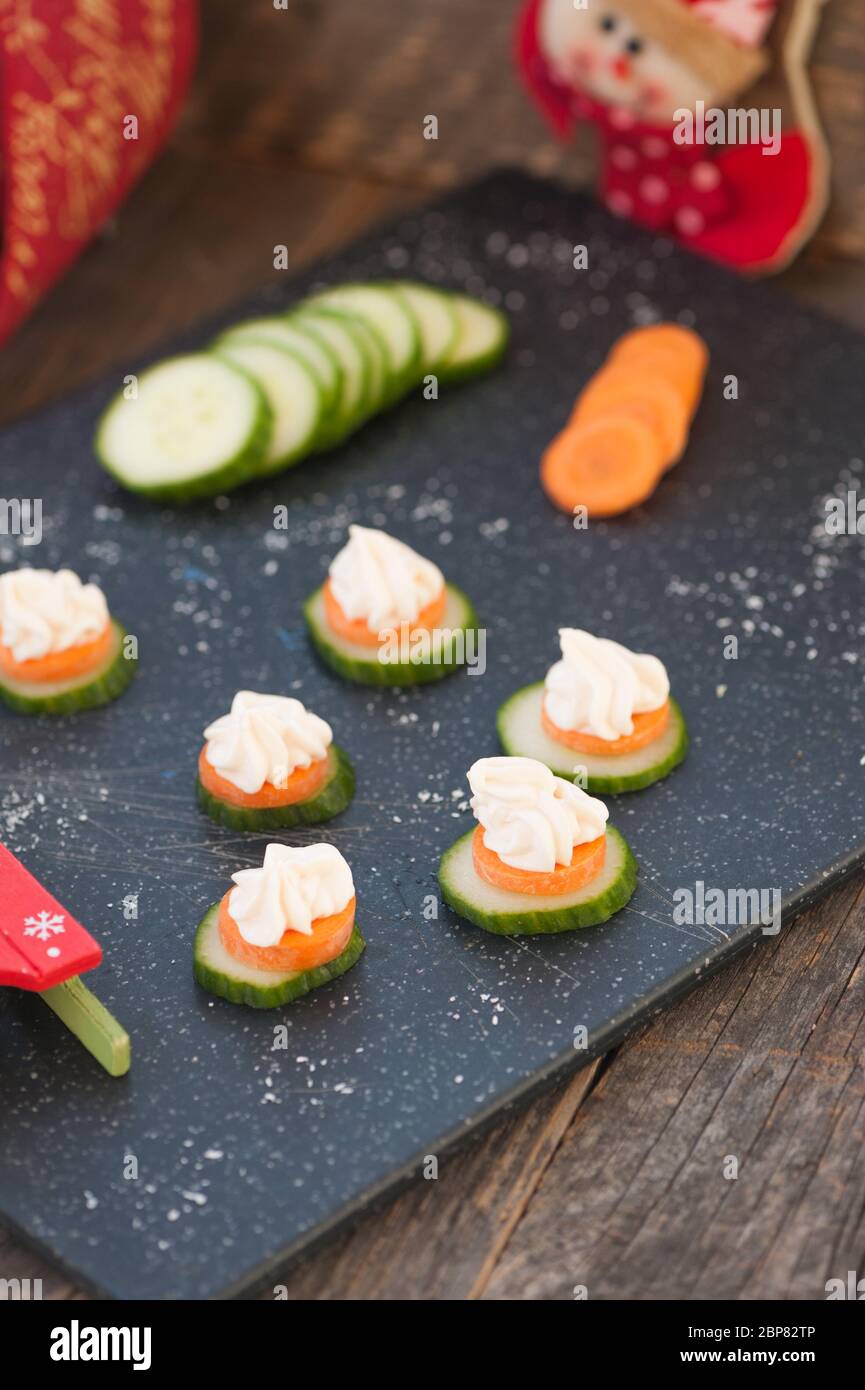 Smoked salmon spread on cucumber Stock Photo Alamy