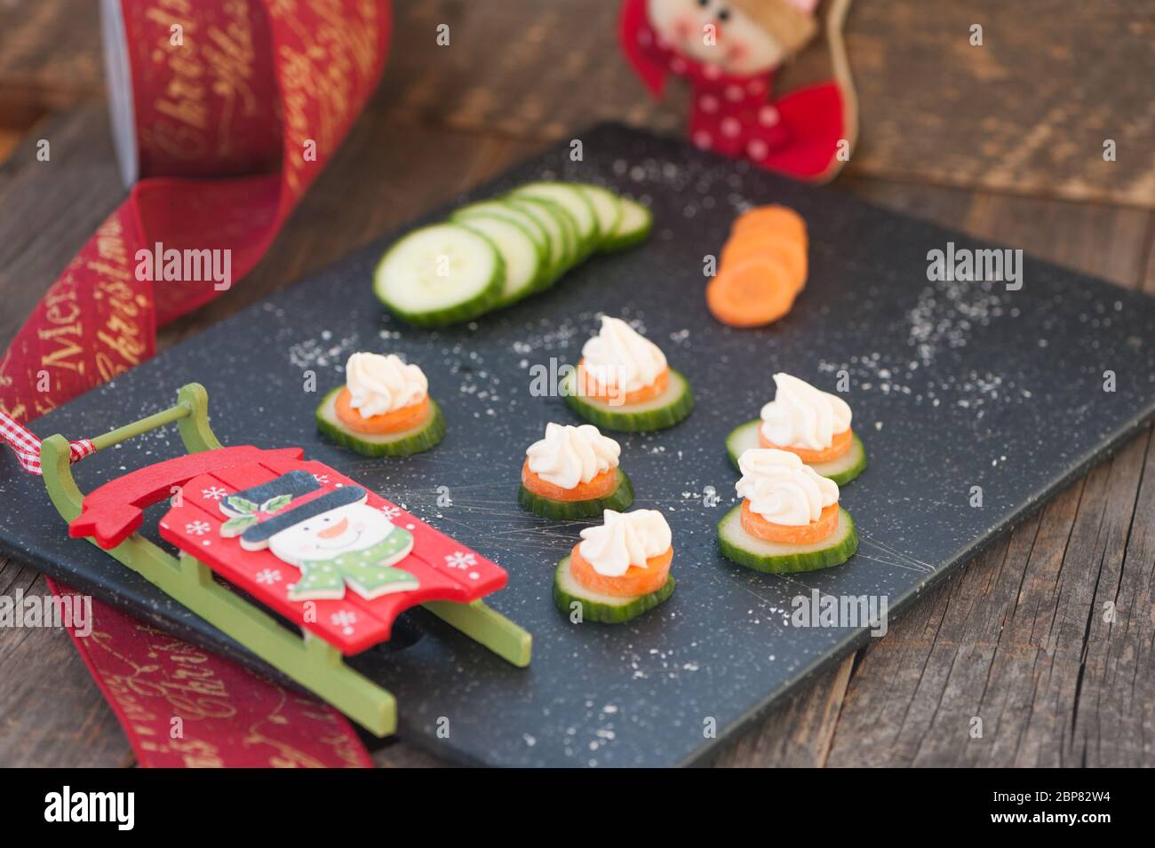 Smoked salmon spread on cucumber Stock Photo Alamy