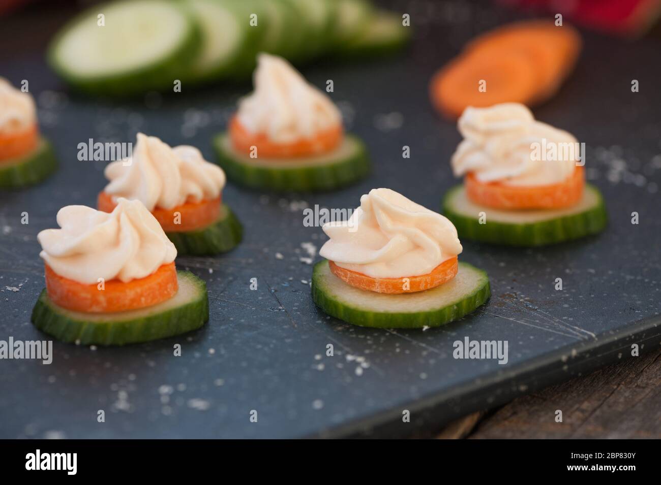 Smoked salmon spread on cucumber Stock Photo Alamy