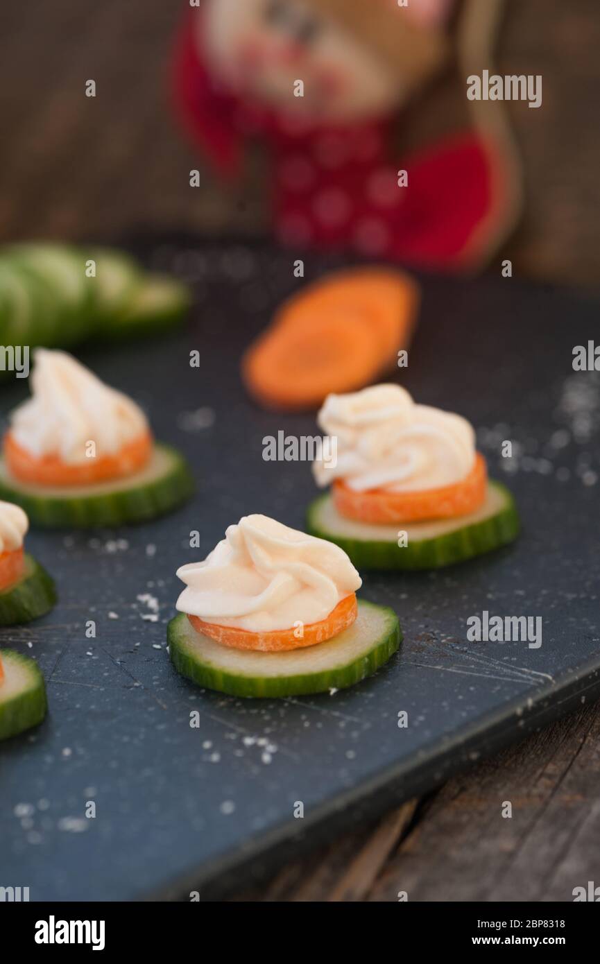 Smoked salmon spread on cucumber Stock Photo Alamy