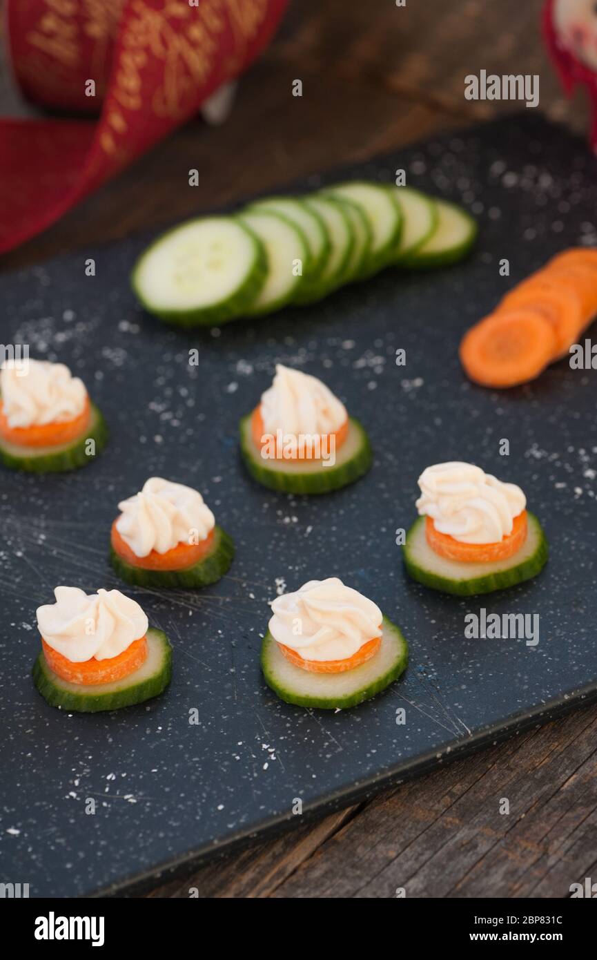Smoked salmon spread on cucumber Stock Photo Alamy