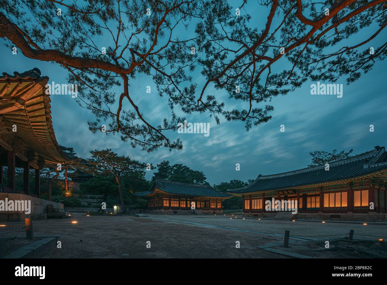 Seoul, South Korea - 17 May 2020: Changgyeonggung is one of the only palaces in Korea that offer regular night hours.  Lit up wonderfully at night, th Stock Photo