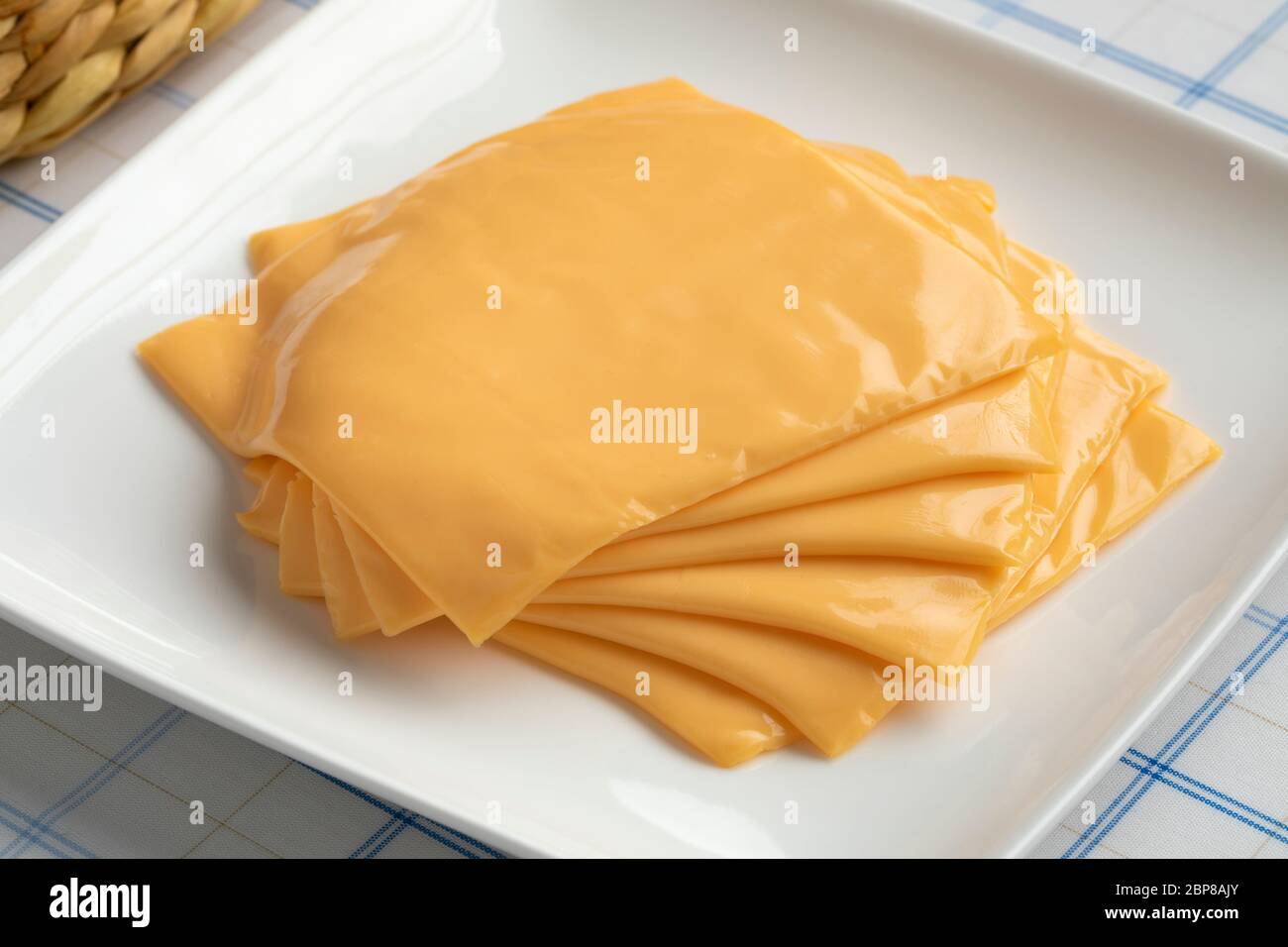 Slices Of Cheddar Cheese Ready To Melt Close Up Stock Photo Alamy Slices Of Cheddar Cheese Ready To Melt Close Up Stock Photo Alamy