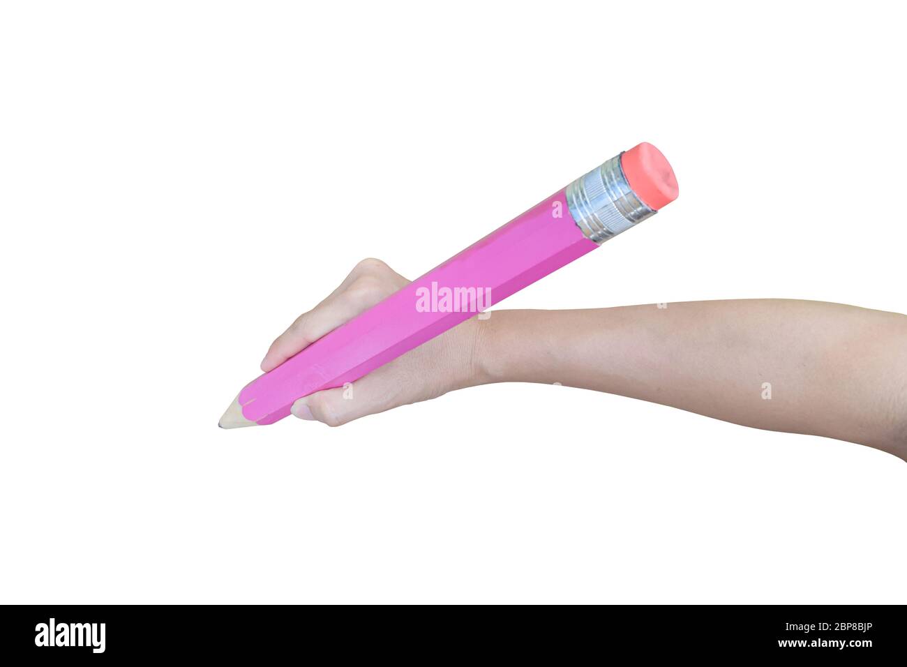 Hand is holding big pencil writing, Isolated on white background. Stock Photo