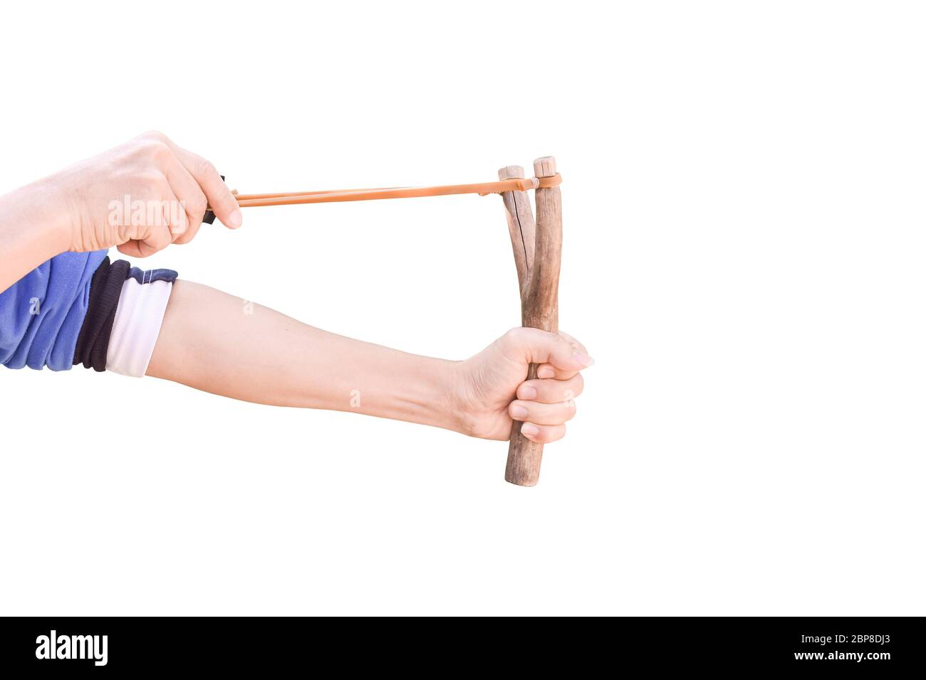 Hand holding aiming Slingshot, Isolated on white background with clipping path. Stock Photo
