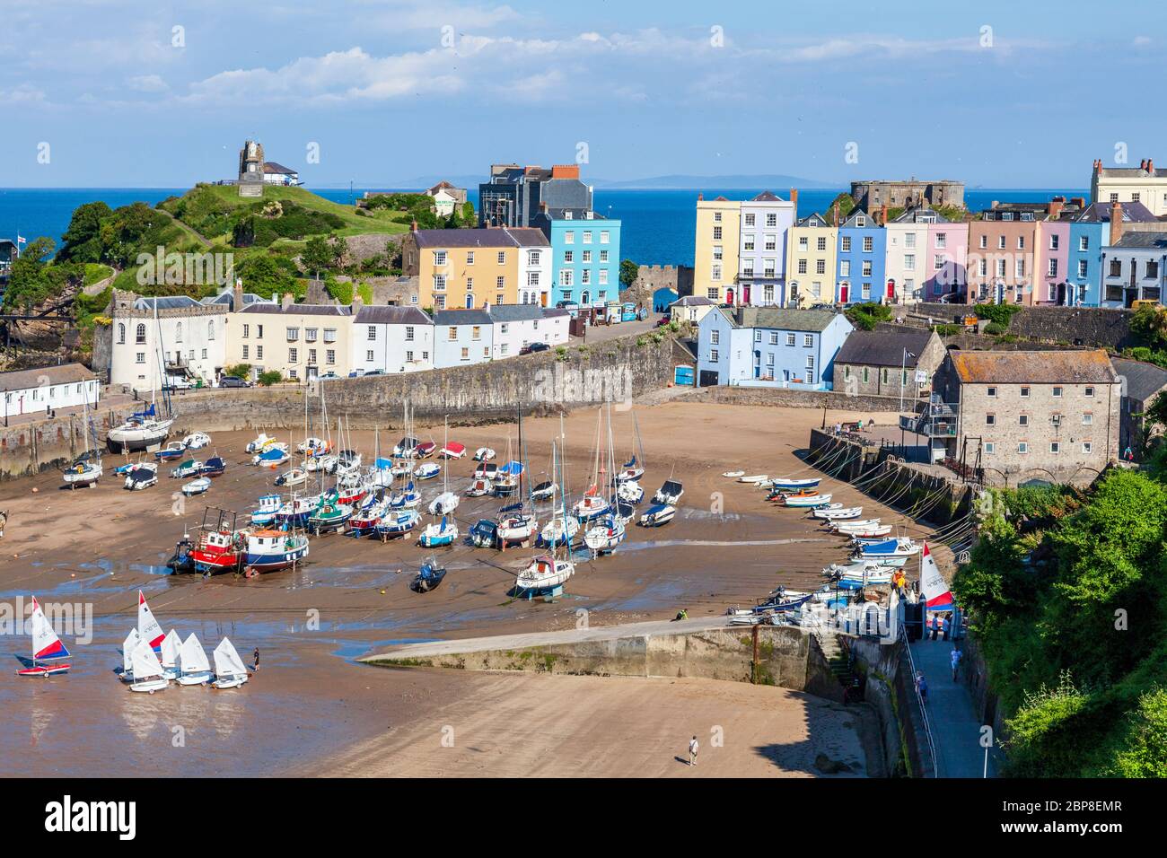 Tenby Harbour at low tide, Pembrokeshire, Wales Stock Photo