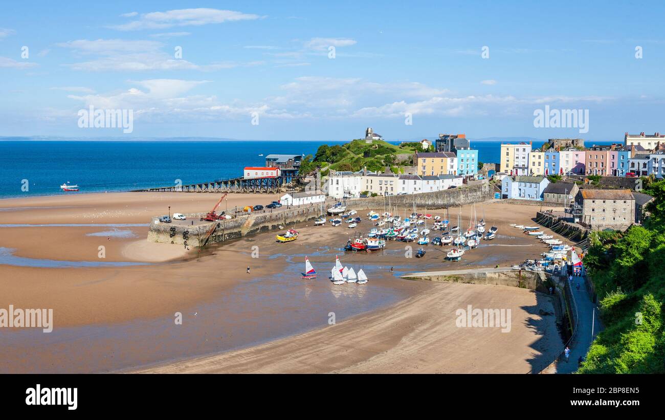 Tenby Harbour at low tide, Pembrokeshire, Wales Stock Photo