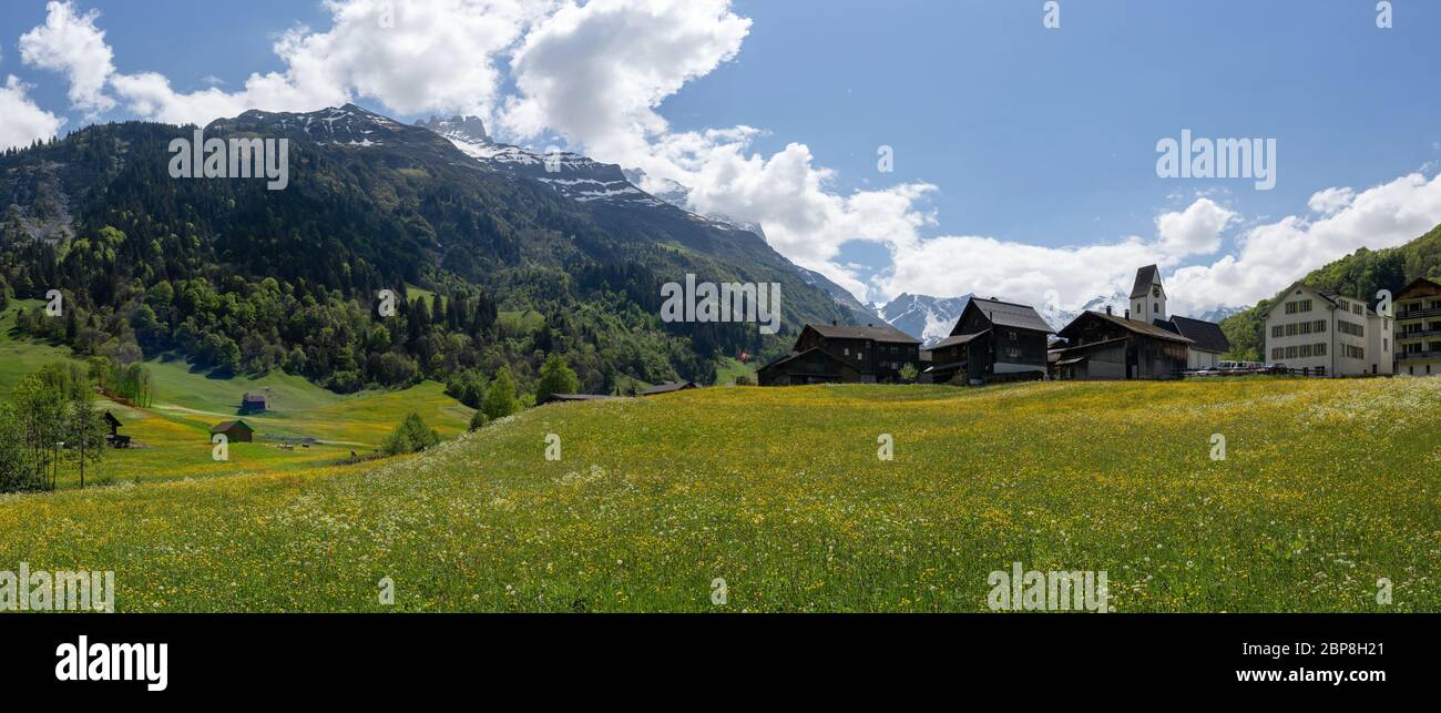 Elm, GL / Switzerland - 17 May 2020: historic village and church of Elm in the canton of Glarus in the heart of the Swiss Alps Stock Photo
