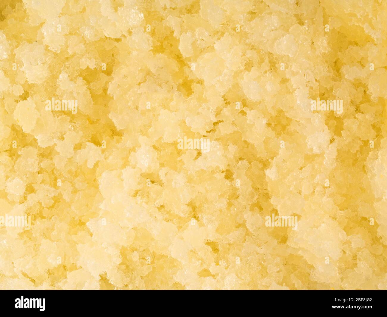close up of italian summer dessert lemon granita food background Stock Photo