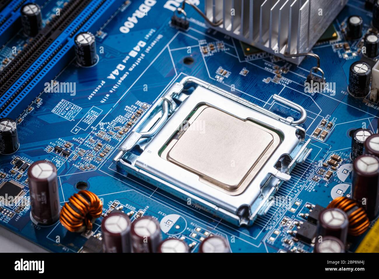Blue electronic circuit board close up shot Stock Photo - Alamy