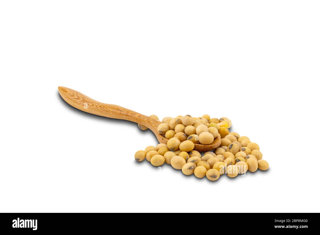 Soy beans in wooden spoon on white background with clipping path. Soy bean is important bean that provide vegetable protein for people. Stock Photo