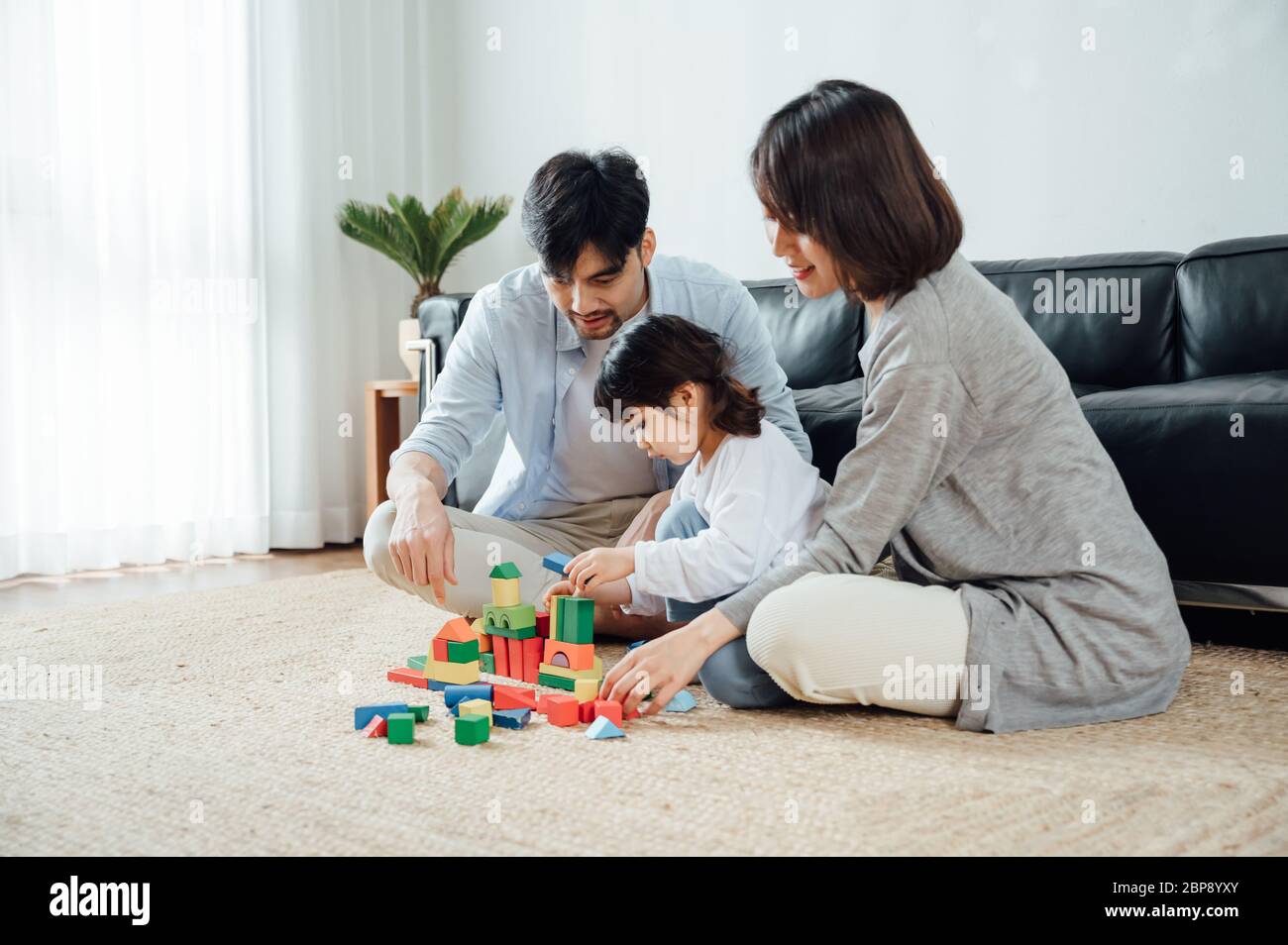 Child help build hi-res stock photography and images - Alamy