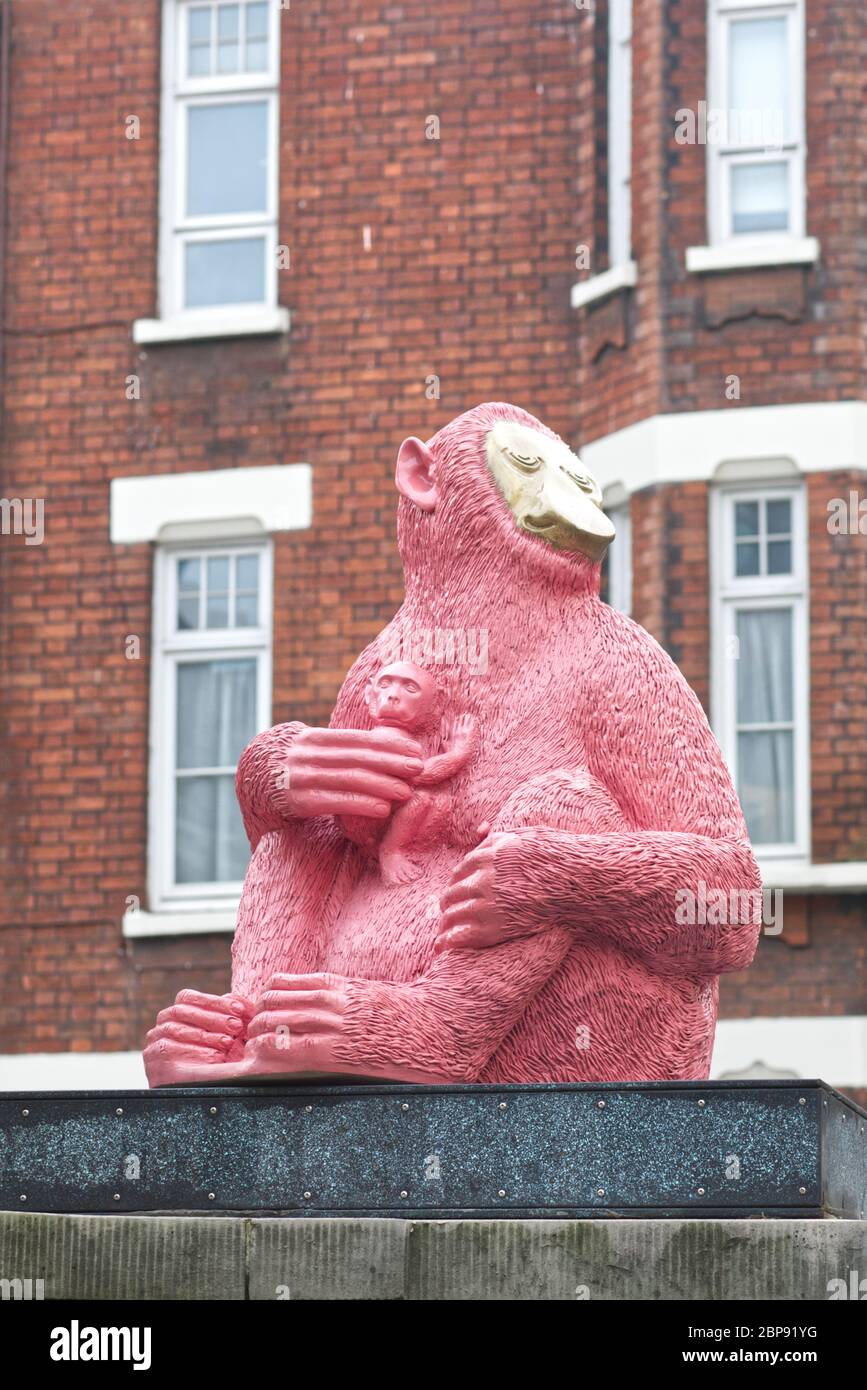 pink monkey and young, sculpture, Brown Hart Gardens, London. Stock Photo