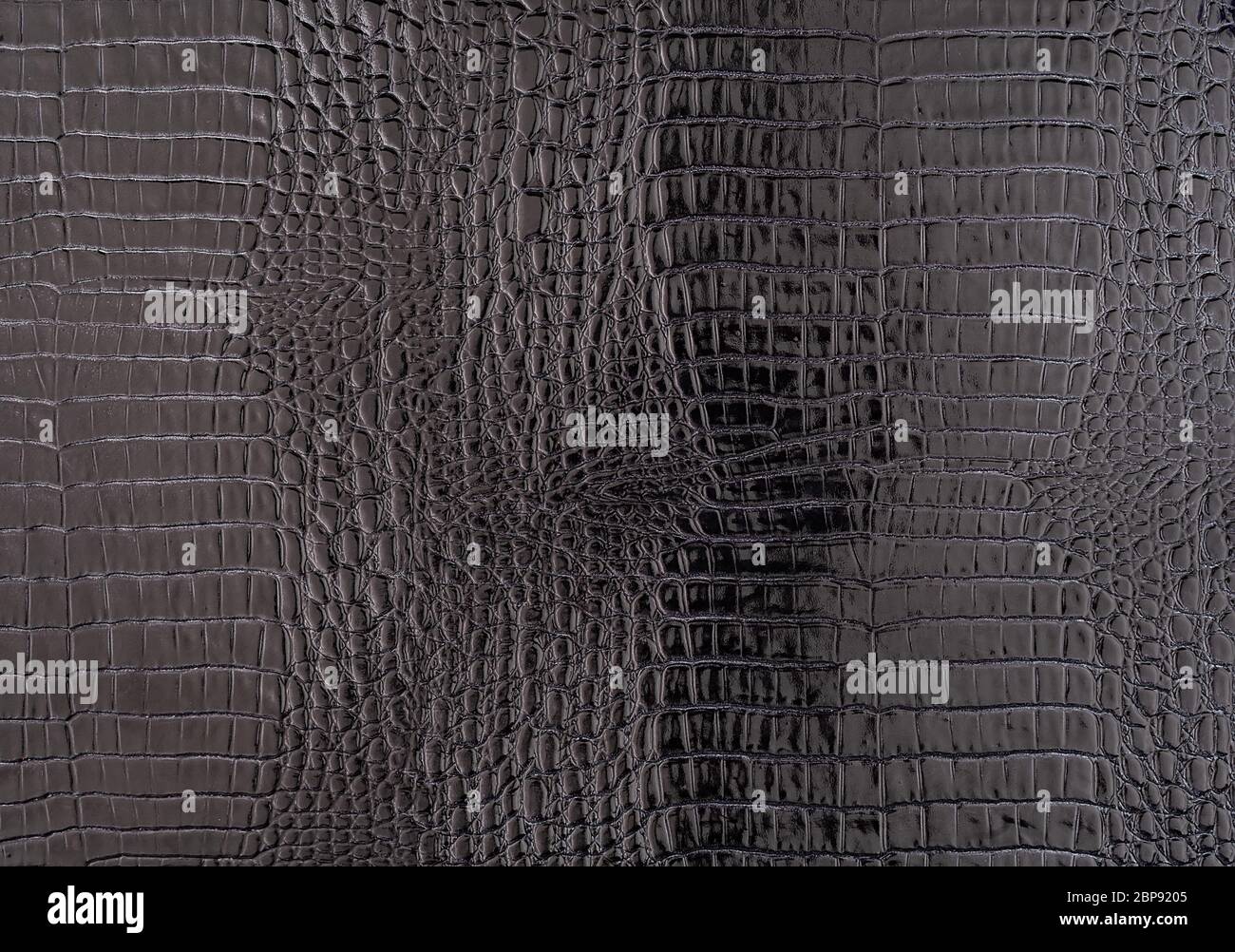 Imitation black crocodile skin background Stock Photo