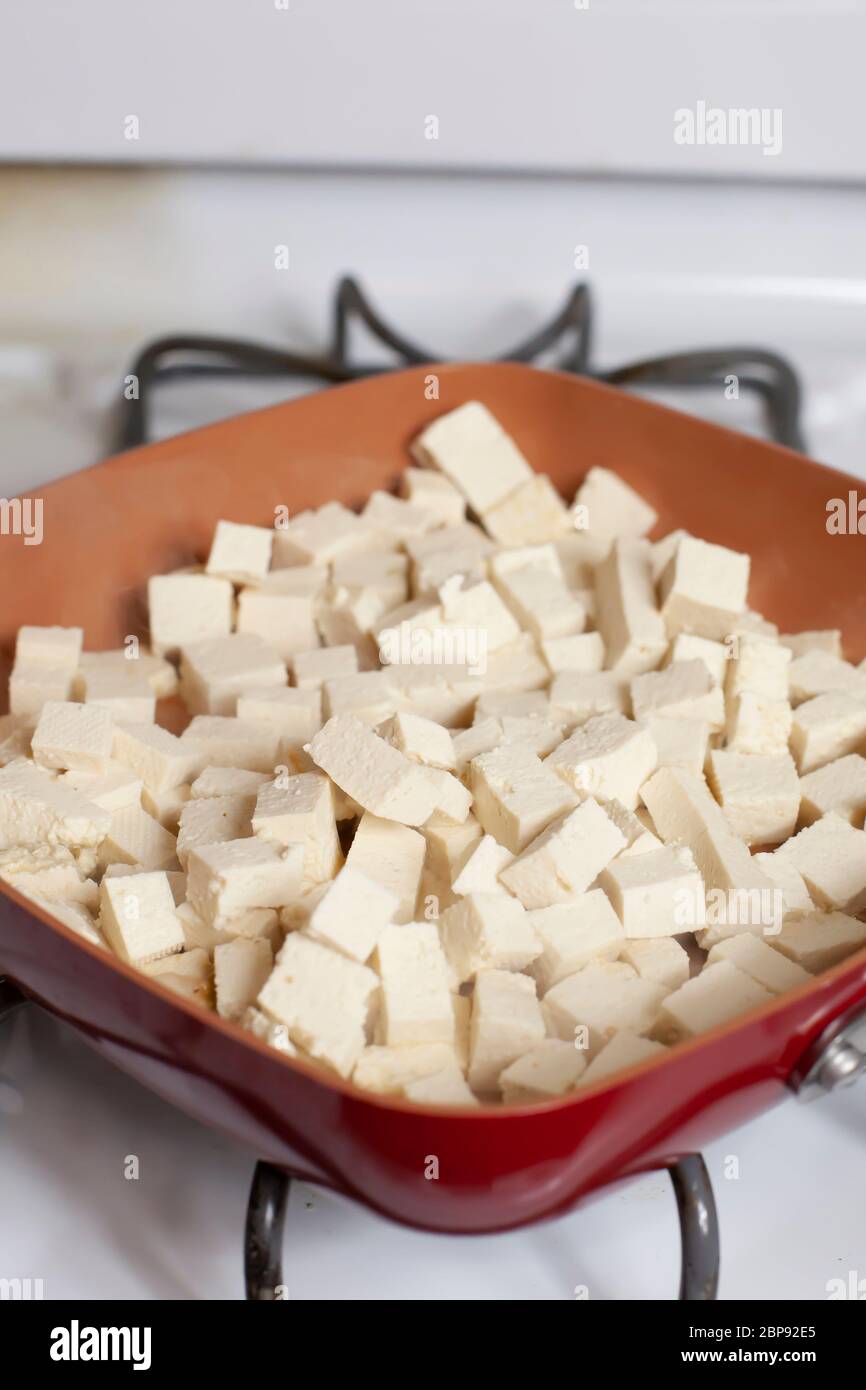 Tofu in a frying pan hires stock photography and images Alamy