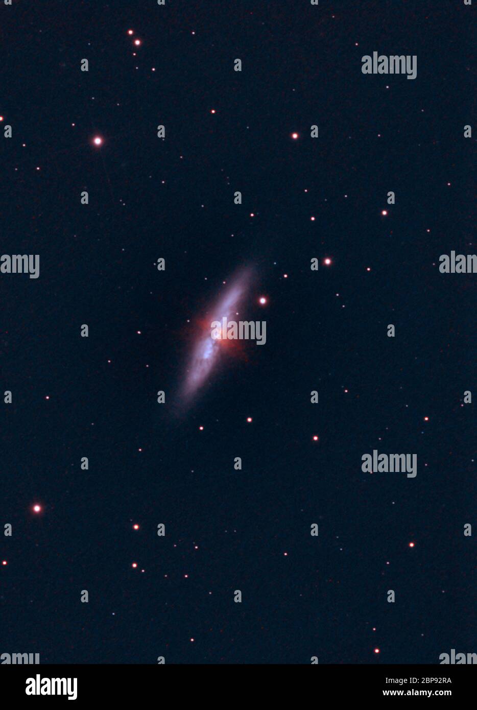 M82 Irregular Galaxy in Ursa Major with distinctive red Hydrogen Alpha emissions, 12 million lt. years from Earth, photographed from London, UK Stock Photo