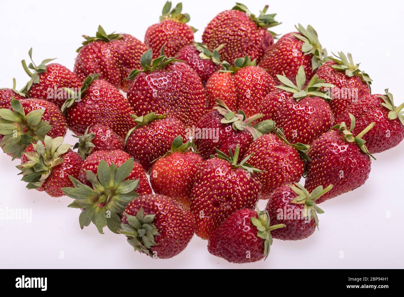 fresh ripe strawberries isolated on white background Stock Photo - Alamy