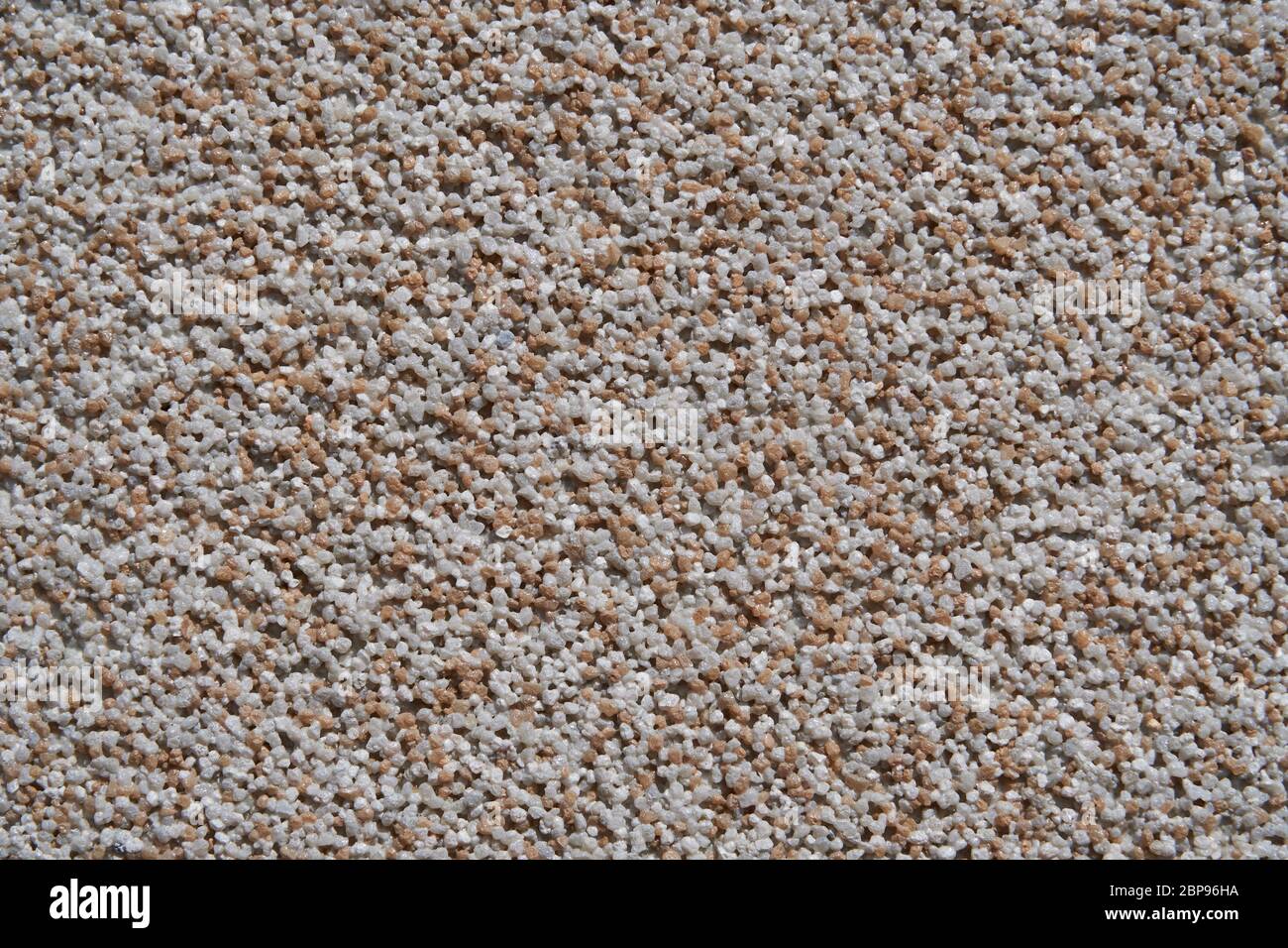 close view of the wall surface, decorative finishing, heat insulation granules or granite particles Stock Photo
