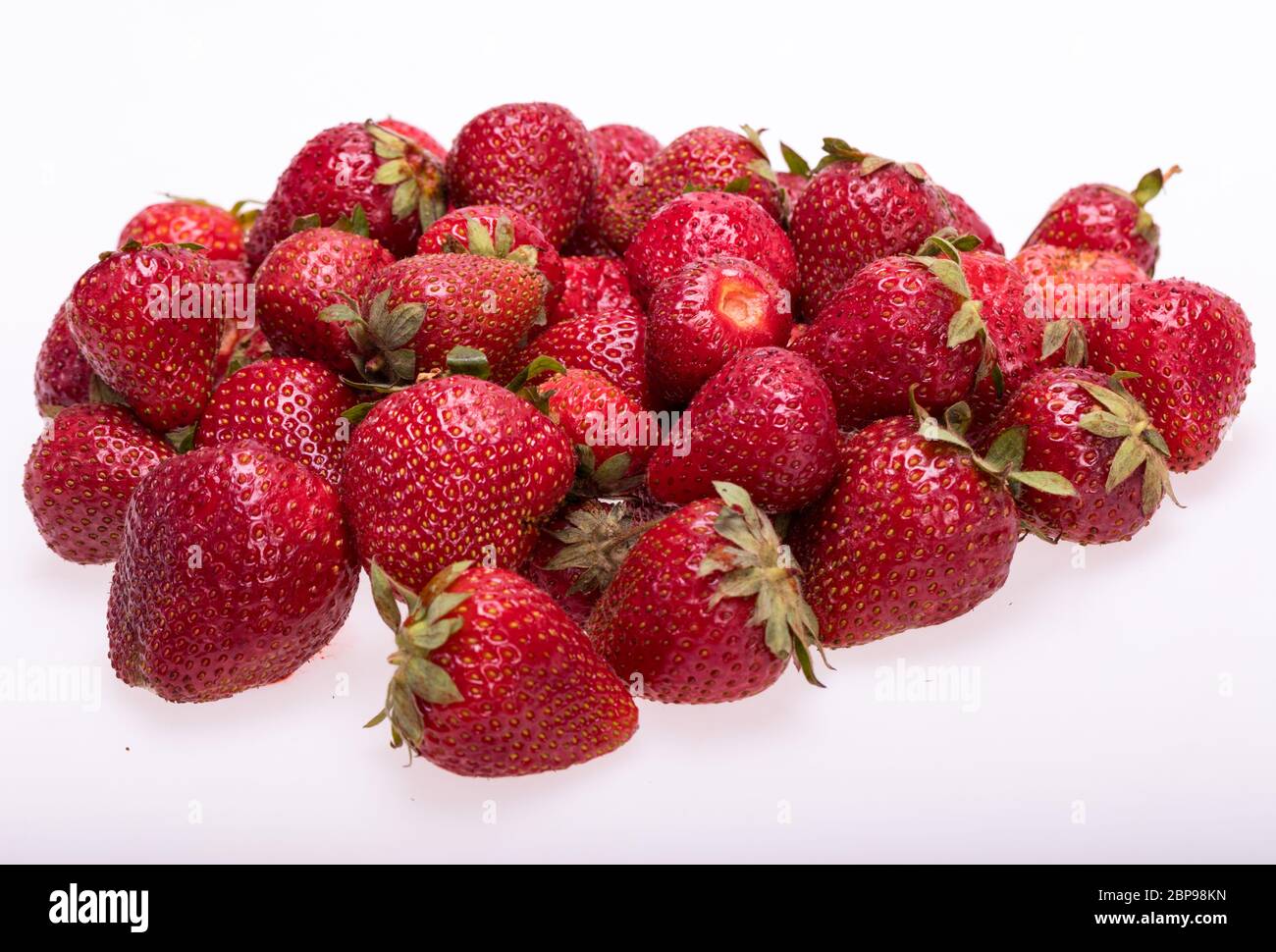 fresh ripe strawberries isolated on white background Stock Photo - Alamy
