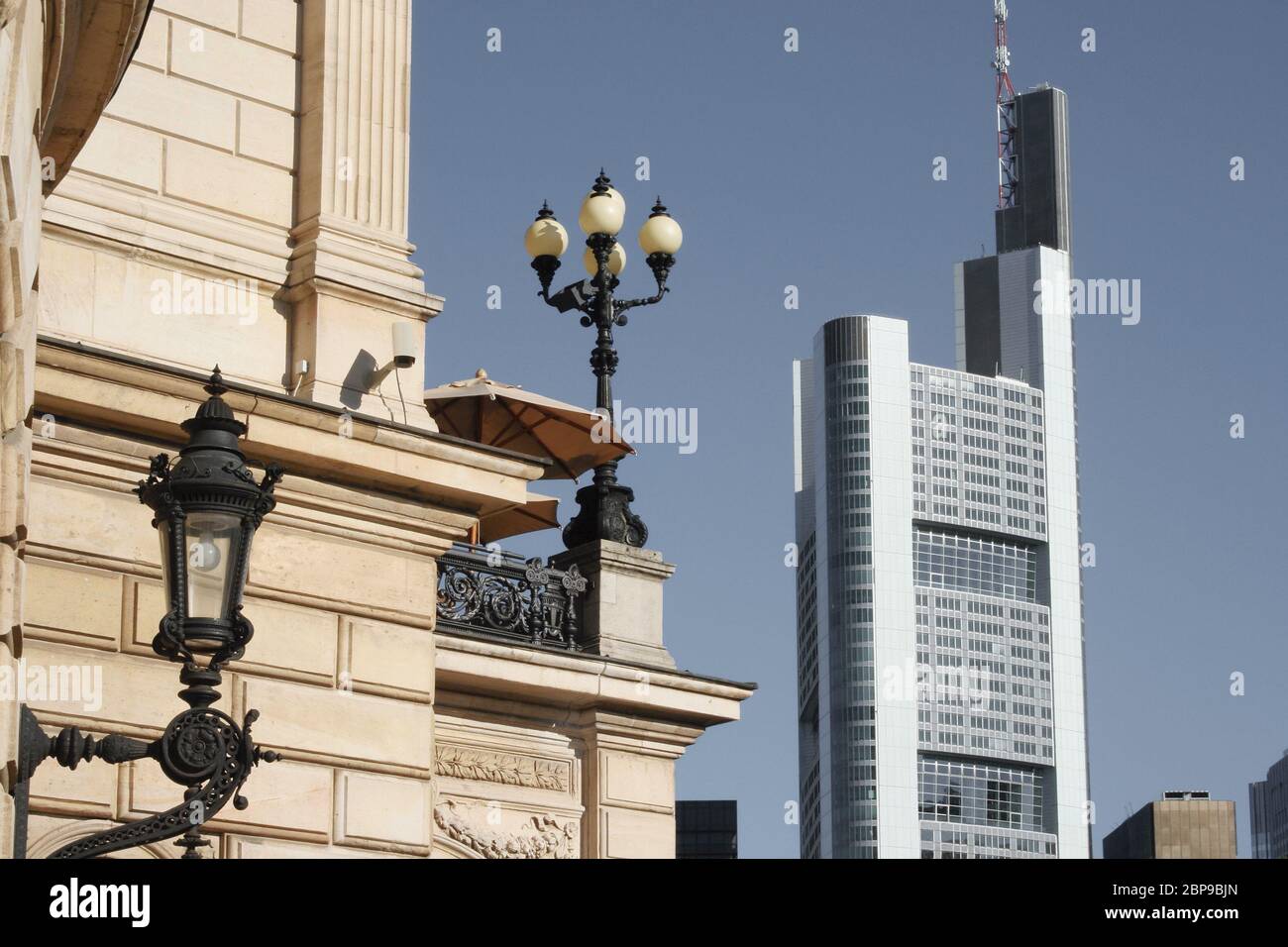 Old opera and modern high-rise architecture in Frankfurt, Germany. Alte Oper und moderne Hochhausarchitektur in Frankfurt am Main, Deutschland. Stock Photo