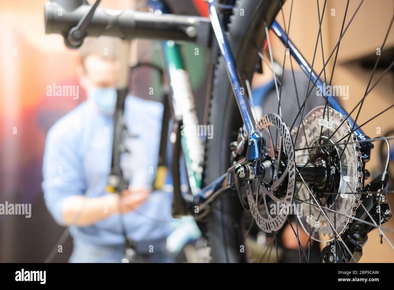 Bicycle repair shop, technical maintenance of a bike. Closeup view of