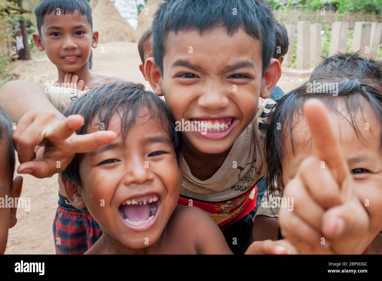 Cambodian children enjoying posing for the camera, Kampong Cham