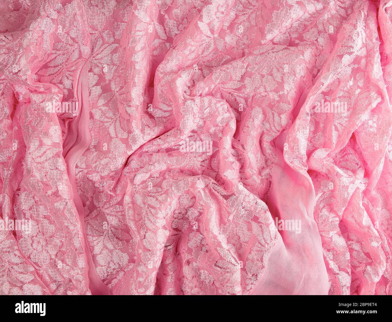 fragment of pink guipure, full frame, close up Stock Photo