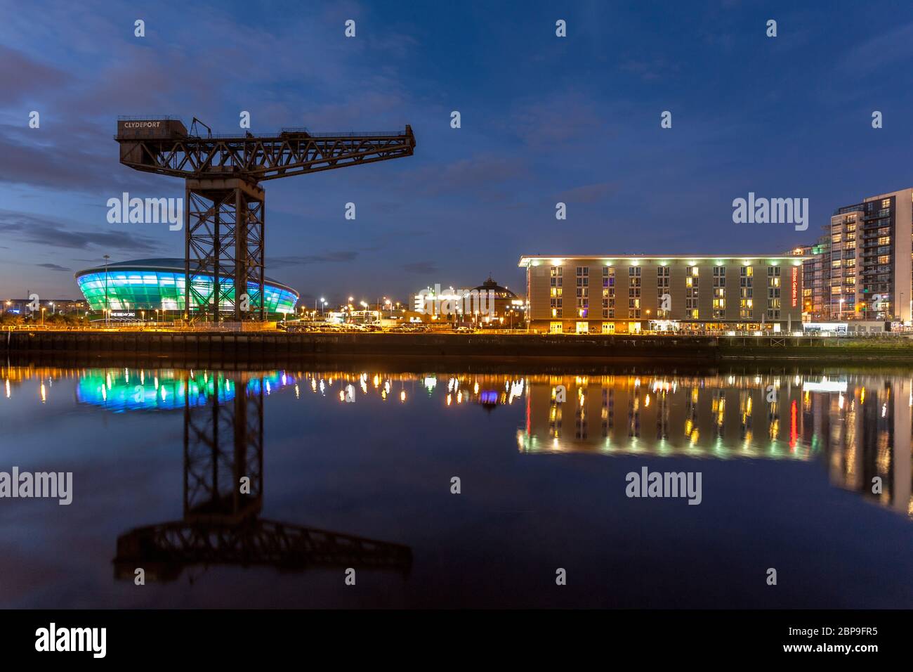 Finnieston Crane, Hydro Arena Concert Venue, River Clyde at Dusk, Glasgow, Scotland Stock Photo