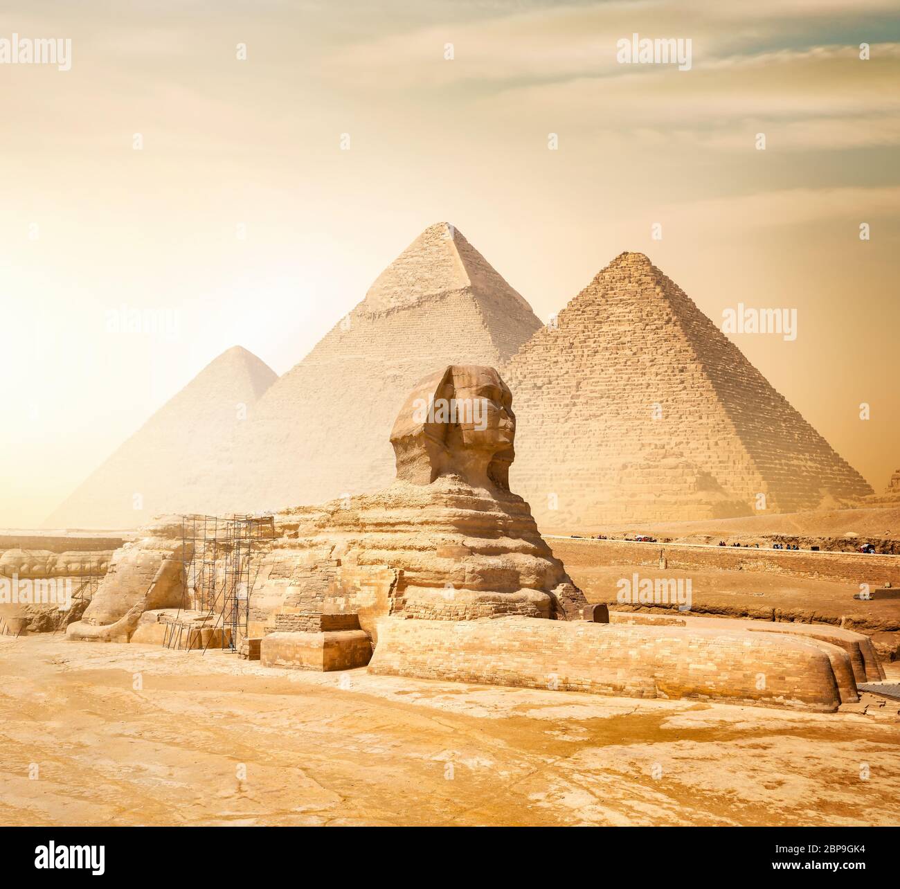 Sphinx and pyramids in the egyptian desert Stock Photo - Alamy