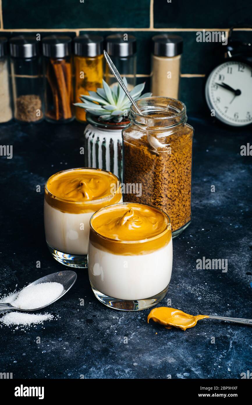 Dalgona coffee drink background. Korean coffee drink made with whipped