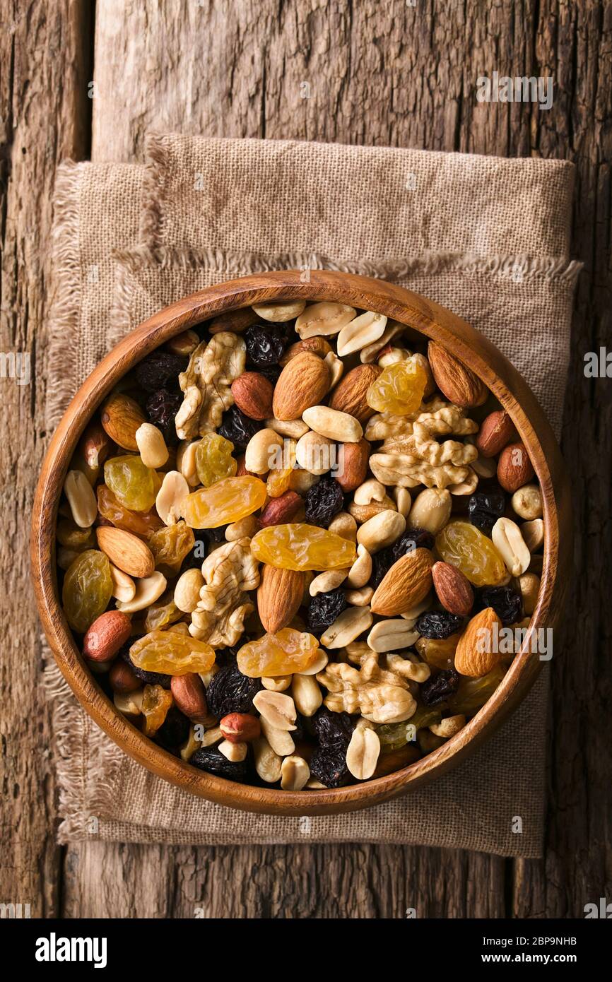 Healthy trail mix snack made of nuts (walnut, almond, peanut) and dried ...