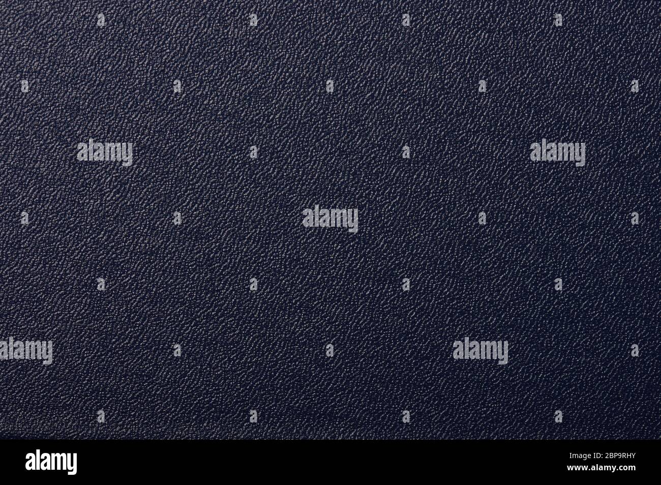 Dark blue leather rough surface macro close up view Stock Photo