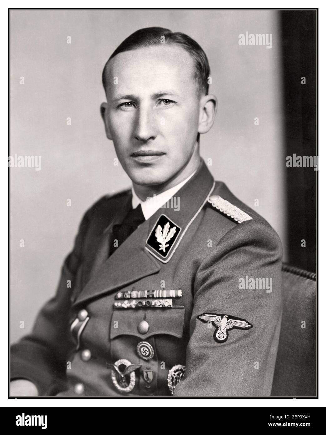 Reinhard Heydrich Nazi archive portrait 1939 German military & political leader high-ranking German Nazi official assassinated in Prague by brave resistance fighters in 1942 Reinhard Tristan Eugen Heydrich was a high-ranking German SS and police official during the Nazi era, a fervent supporter of Adolf Hitler and a main architect of the Holocaust. He was chief of the Reich Main Security Office. He was also Stellvertretender Reichsprotektor of Bohemia and Moravia. A brutal war criminal by any account, whose timely assassination was much celebrated across anti-Nazi Europe. Stock Photo