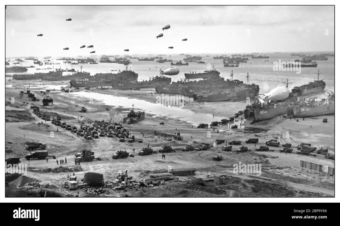 OMAHA BEACH D-Day +1 Normandy WW2 B&W image D Day Plus 1 LCT landing craft  tank with barrage balloons afloat, logistics unloading supplies on Omaha  beach for the break-out from Normandy. June