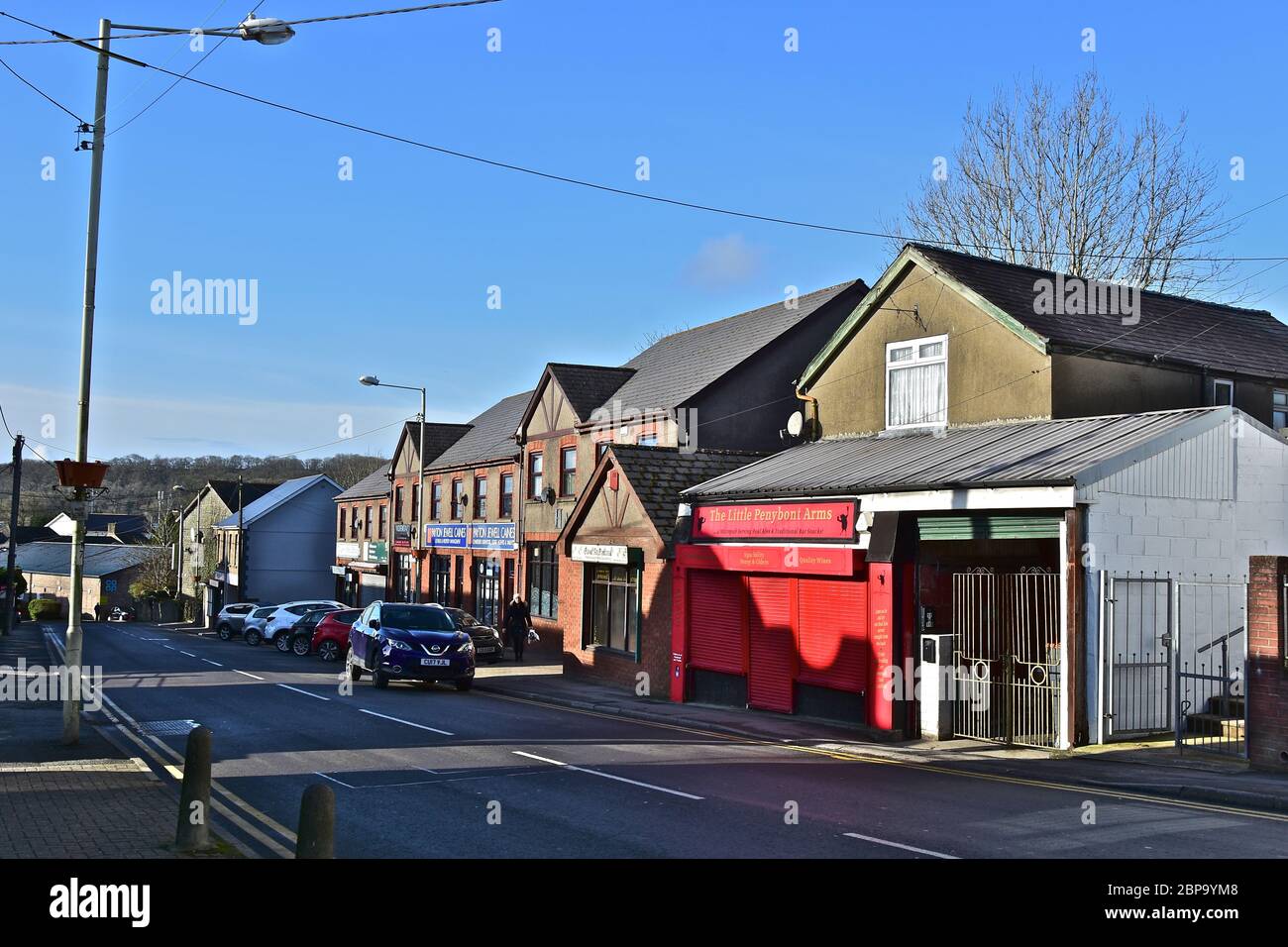 A general view of the shops and other small businesses along Penybont Road in the centre of the small Welsh town of Pencoed. Stock Photo
