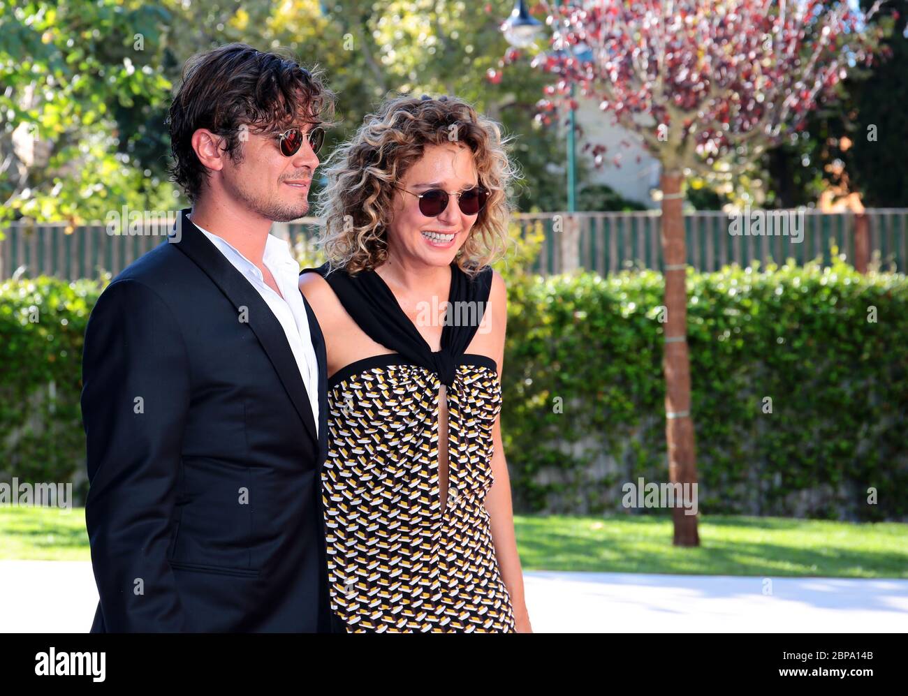VENICE, ITALY - AUGUST 28: Riccardo Scamarcio  and Valeria Golino attends 'La Vita Oscena' Premiere during the 71st Venice Film Festival Stock Photo
