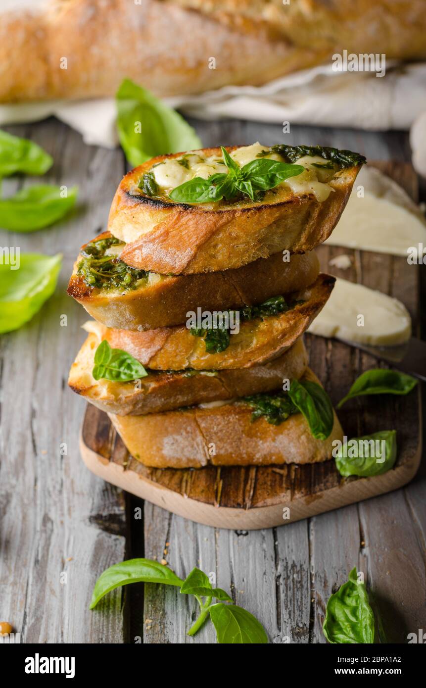 Garlic herbs toast with fresh mozzarella, food photography, vintage photography Stock Photo