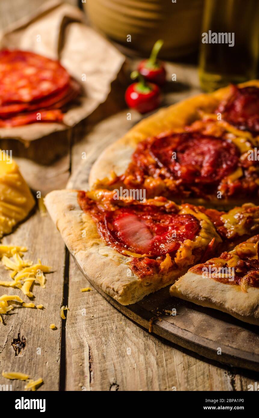 Rustic salami pizza with cheddar cheese and chorizo, delicious chorizo ...